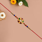 ALVENZA Multicolor Kundan Rakhi - Golden Floral Design with Beaded Red Thread