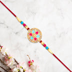 ALVENZA Round Floral Rakhi - Pink-Blue Enamel with Beaded Thread