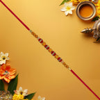ALVENZA Multicolor Beaded Rakhi – Festive Stone Detail & Red Thread