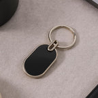 ALVENZA Oval Metal Keychain – Elegant Black & Silver Finish for Stylish Key Organization