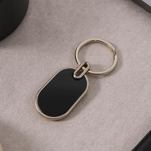 ALVENZA Oval Metal Keychain – Elegant Black & Silver Finish for Stylish Key Organization