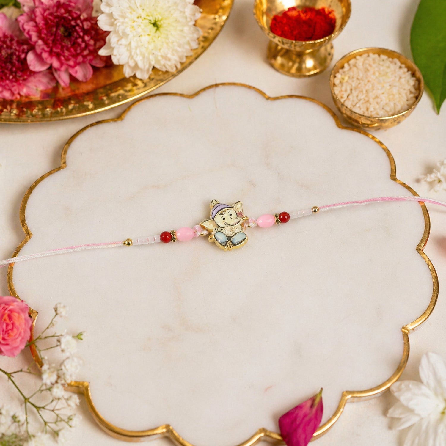 ALVENZA Ganesha Rakhi – Beautiful Pink and Red Beads for Raksha Bandhan