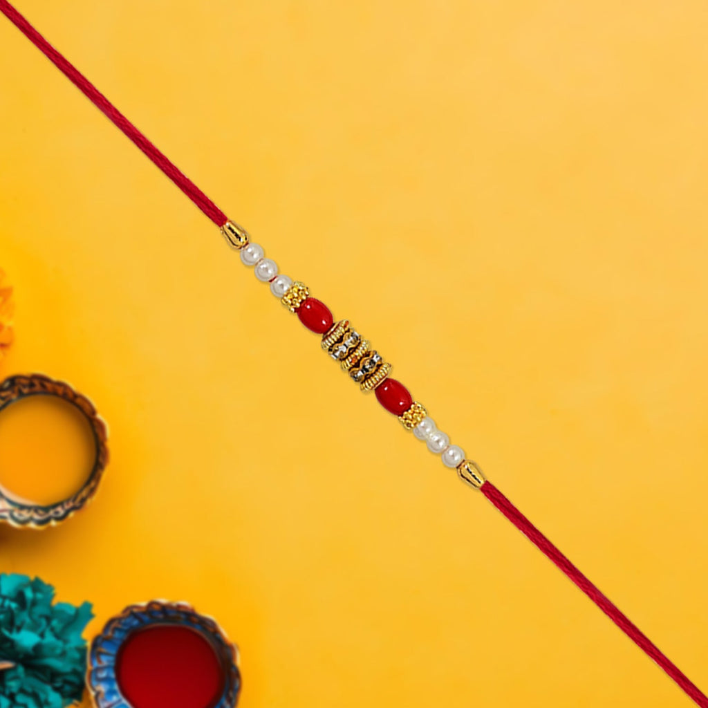 ALVENZA Pearl Beaded Rakhi – Traditional Red & Gold Elegance