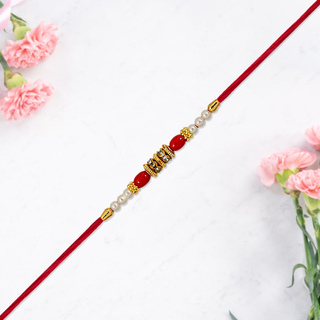 ALVENZA Pearl Beaded Rakhi – Traditional Red & Gold Elegance