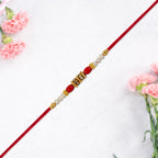 ALVENZA Pearl Beaded Rakhi – Traditional Red & Gold Elegance