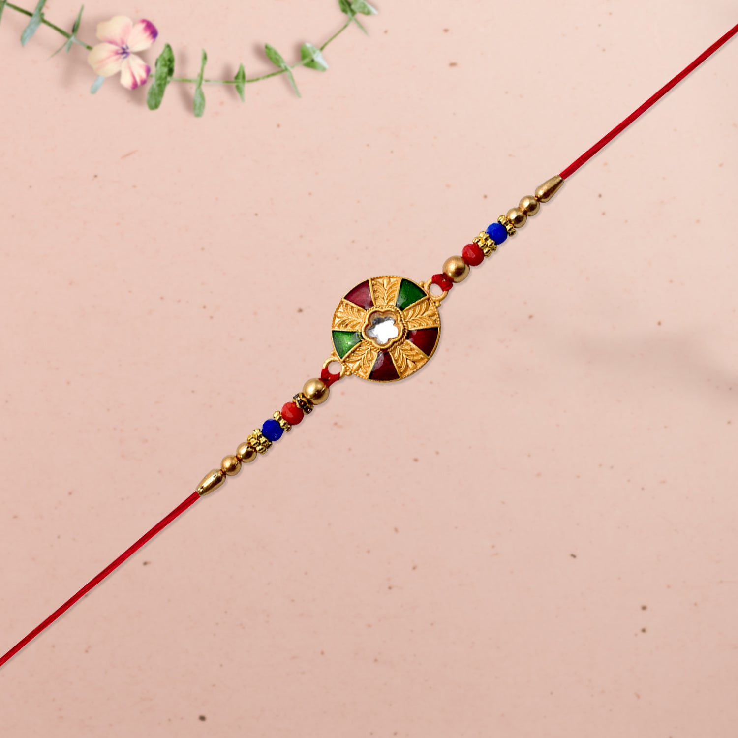 ALVENZA Multicolor Kundan Rakhi - Golden Floral Design with Beaded Red Thread