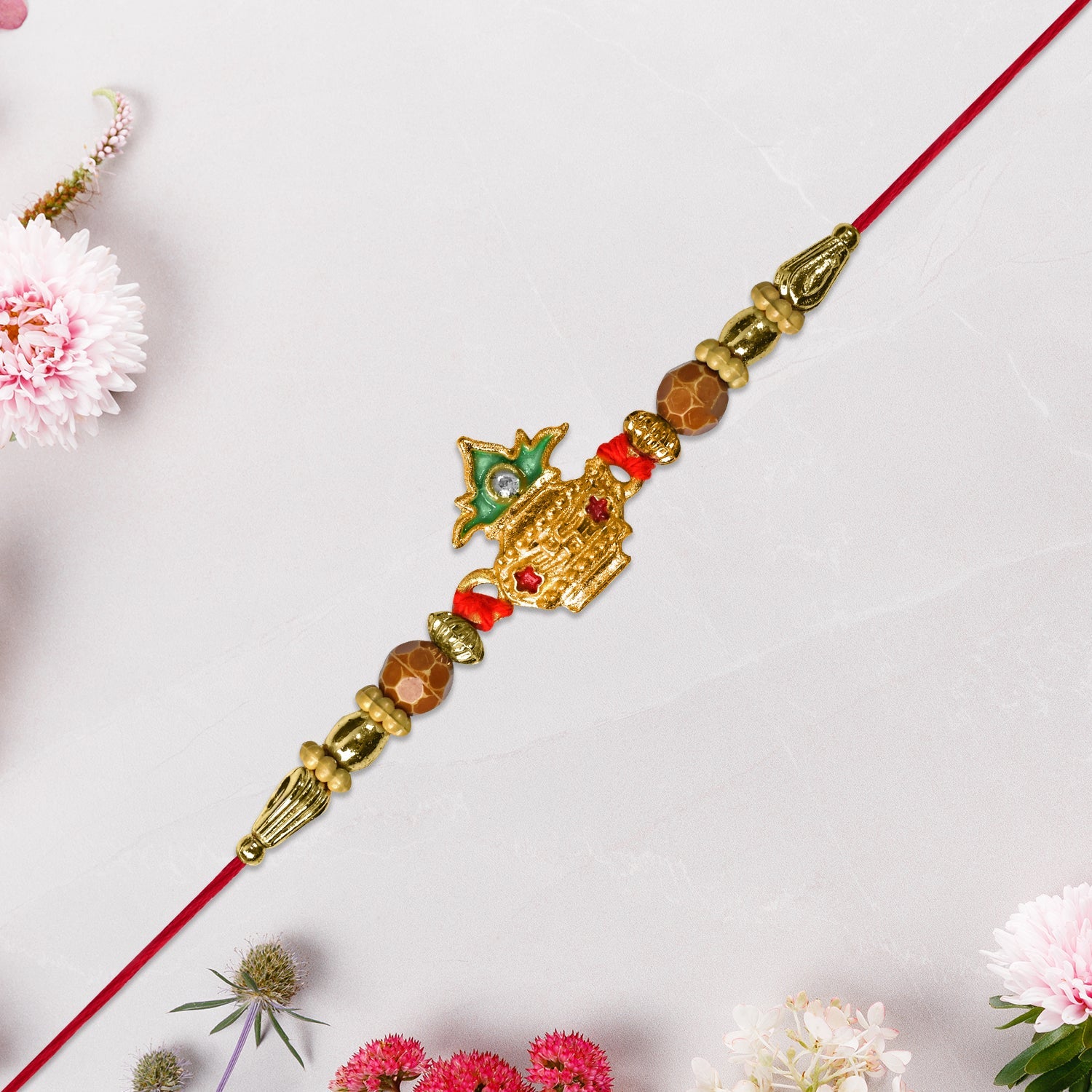 ALVENZA Golden Kalash Rakhi - Elegant Moti Design for Brother