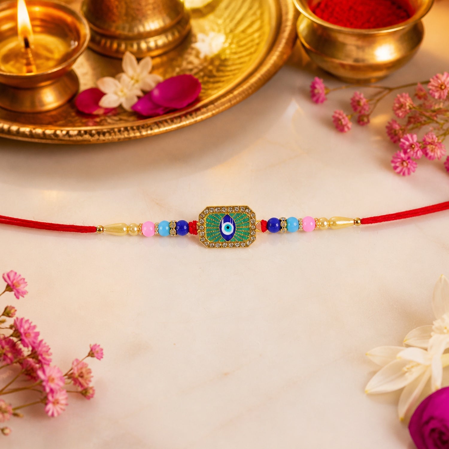 ALVENZA Evil Eye Rakhi – Stylish Mint Green Thread with Traditional Charm