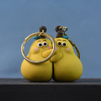 ALVENZA Cute Cartoon Couple Keychain Set – Soft Rubber 2-in-1 Hugging Pair