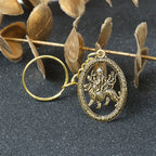 ALVENZA Maa Durga Golden Oval Frame Keychain – Spiritual Protection
