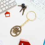 ALVENZA Durga Maa Keychain – Premium Golden Metal with Oval Frame