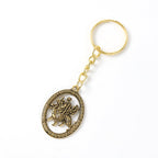 ALVENZA Maa Durga Golden Oval Frame Keychain – Spiritual Protection