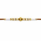 ALVENZA Minimal Pearl Golden Bracelet Rakhi with Sleek Beads and Elegant Red Thread