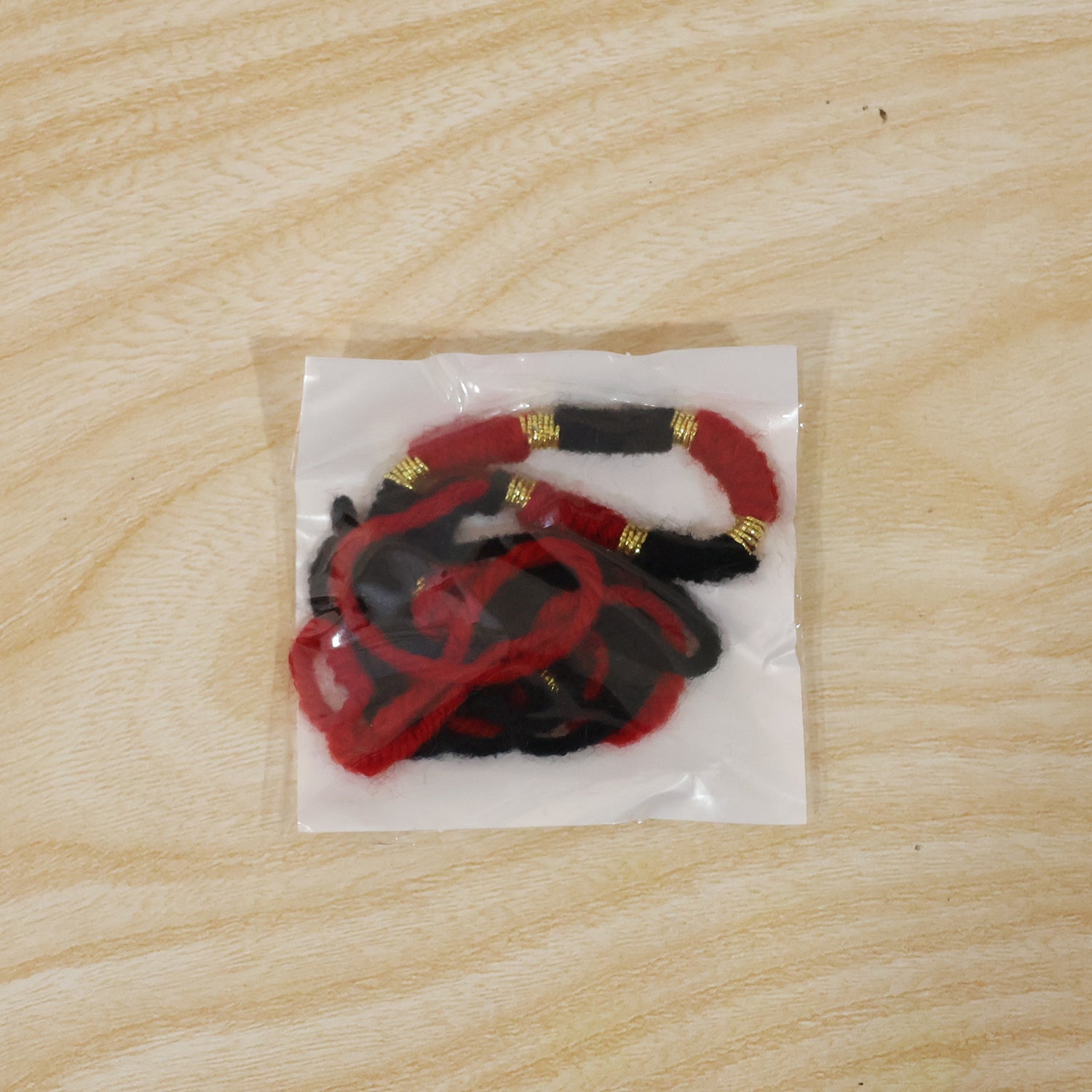 Handmade Rakhi Traditional Beaded Thread with Golden Accents - Detail View 8