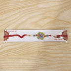ALVENZA Rakhi for Raksha Bandhan – Colorful Beads & Radhe Engraving for Sibling Festival