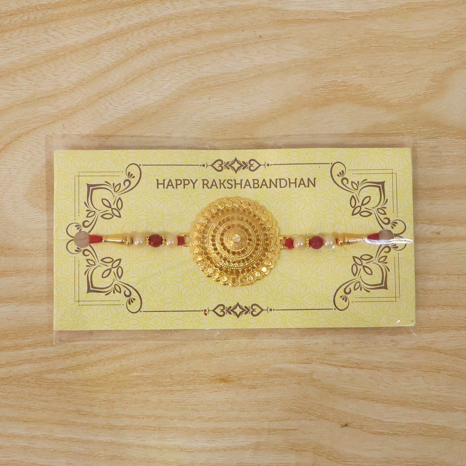 ALVENZA Rakshabandhan Rakhi – Elegant Gold & Pearl Design for Brothers