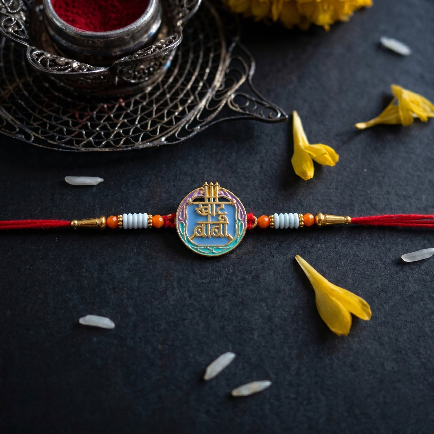 ALVENZA Colorful Rakhi with Beads & Religious Symbol – Traditional Festive Accessory