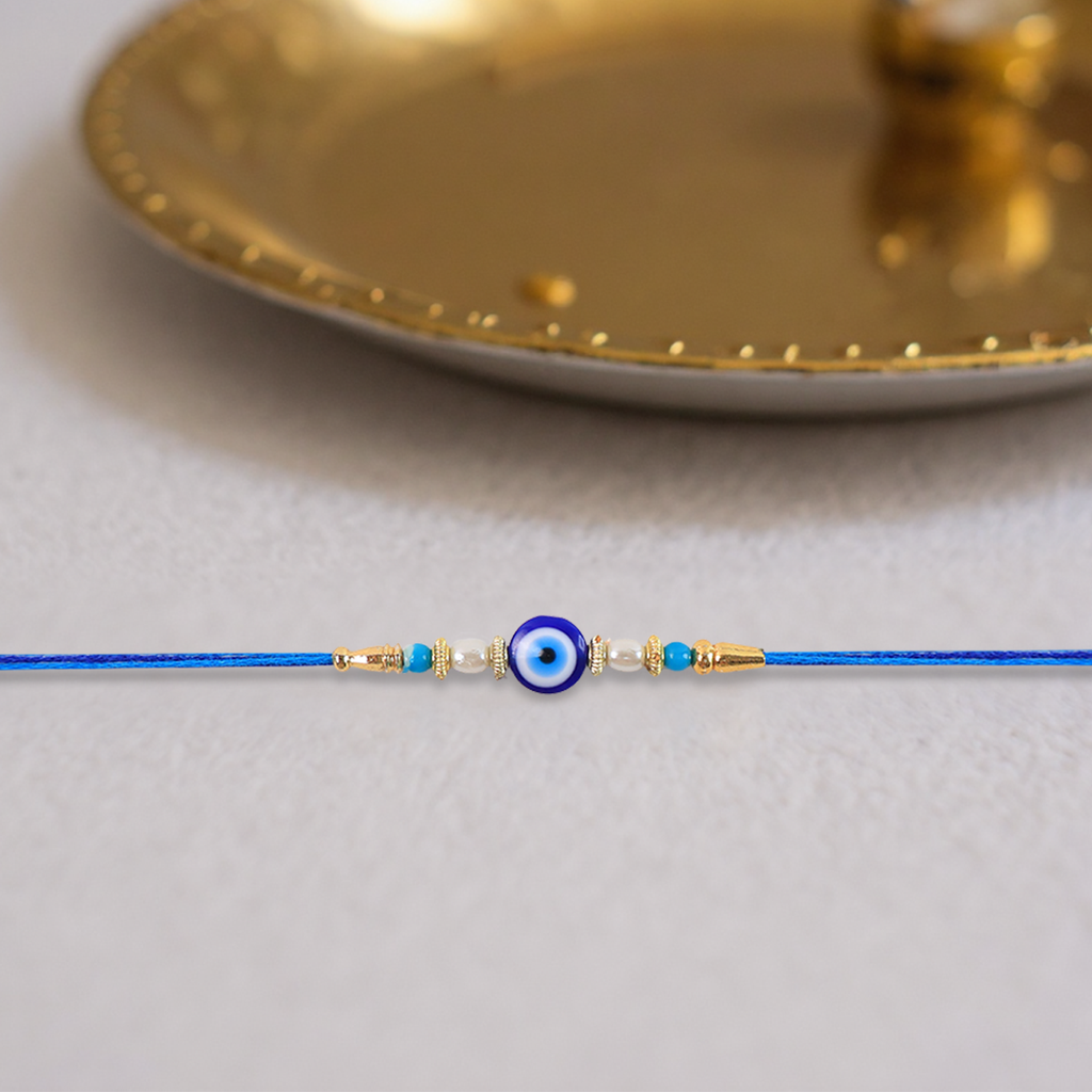 ALVENZA Blue Rakhi – Elegant Stone & Pearl Design for Brother
