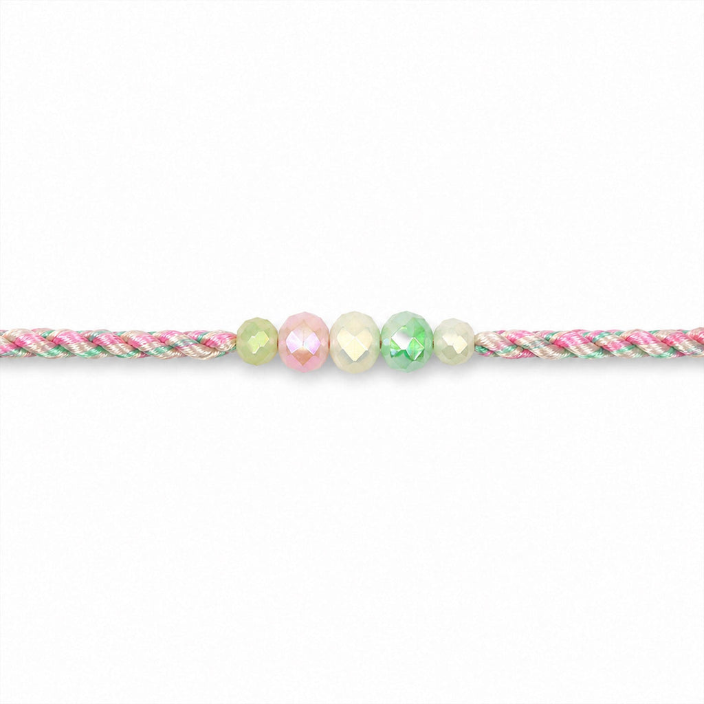 ALVENZA Pastel Pearl Bracelet Rakhi with Soft Pink Green Beads and Delicate Designer Beauty