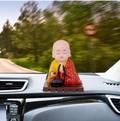 Solar Buddha Statue Moving Head & Hand Decor | XcelCraft