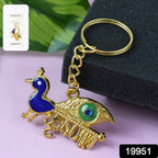 ALVENZA Krishna Peacock Keychain – Spiritual Golden Metal Charm