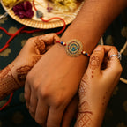 ALVENZA Traditional Flower Design Golden Rakhi - Festive Elegance & Blessings