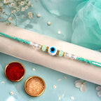 ALVENZA Blue Evil Eye Nazar Charm Rakhi with Turquoise Thread and Bracelet Style Beads