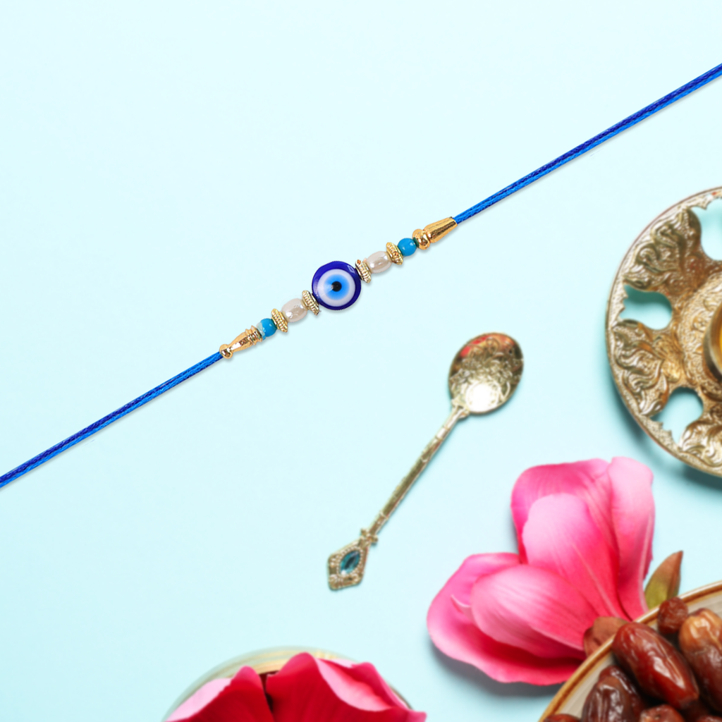 ALVENZA Blue Rakhi – Elegant Stone & Pearl Design for Brother