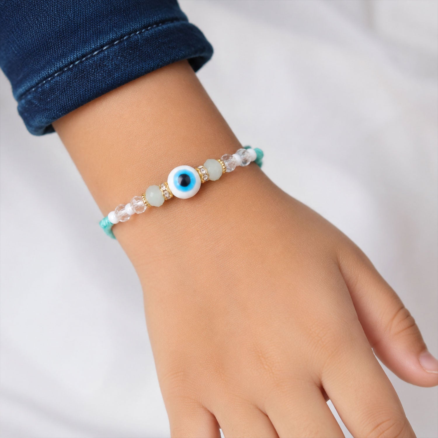 ALVENZA Blue Evil Eye Nazar Charm Rakhi with Turquoise Thread and Bracelet Style Beads
