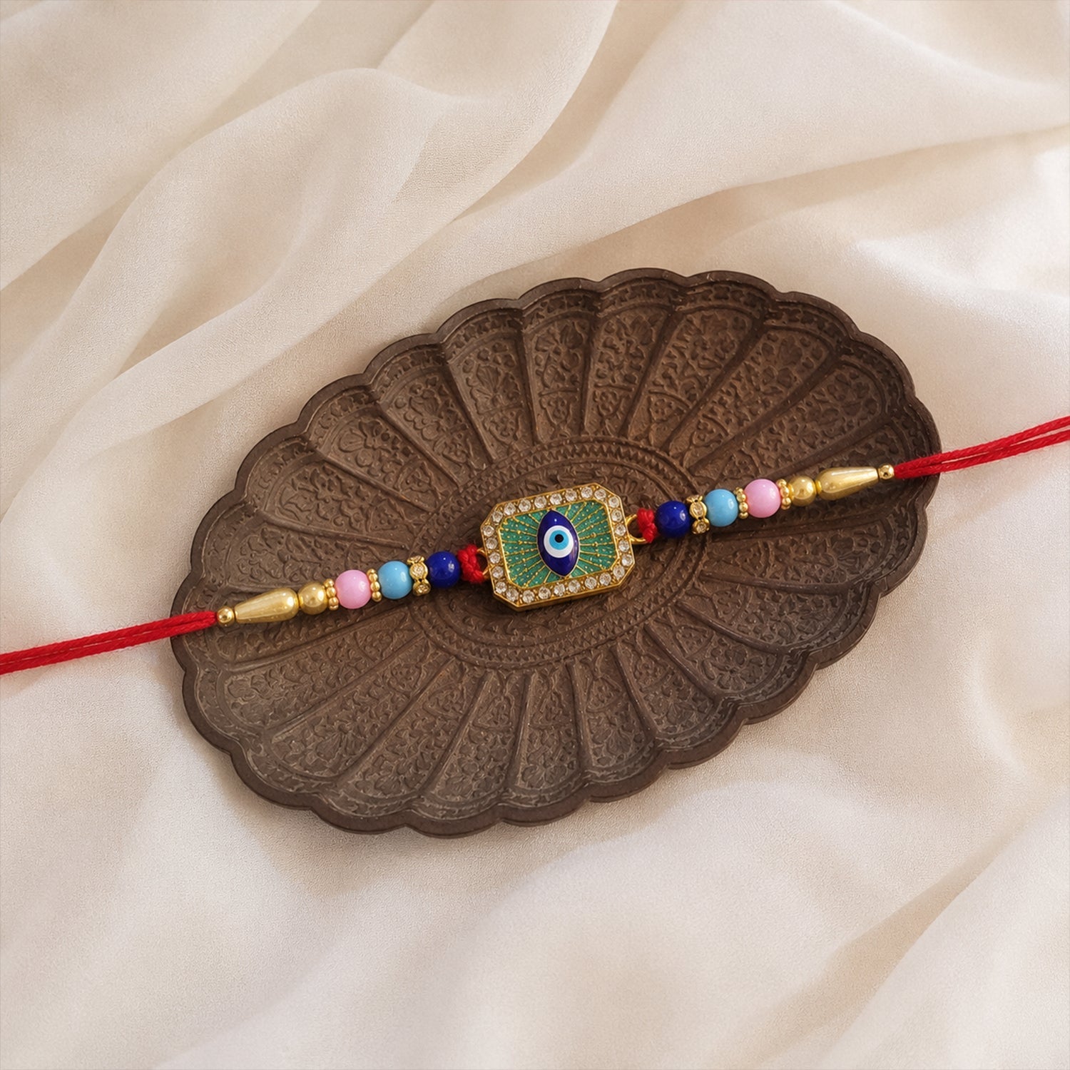 ALVENZA Evil Eye Rakhi – Stylish Mint Green Thread with Traditional Charm