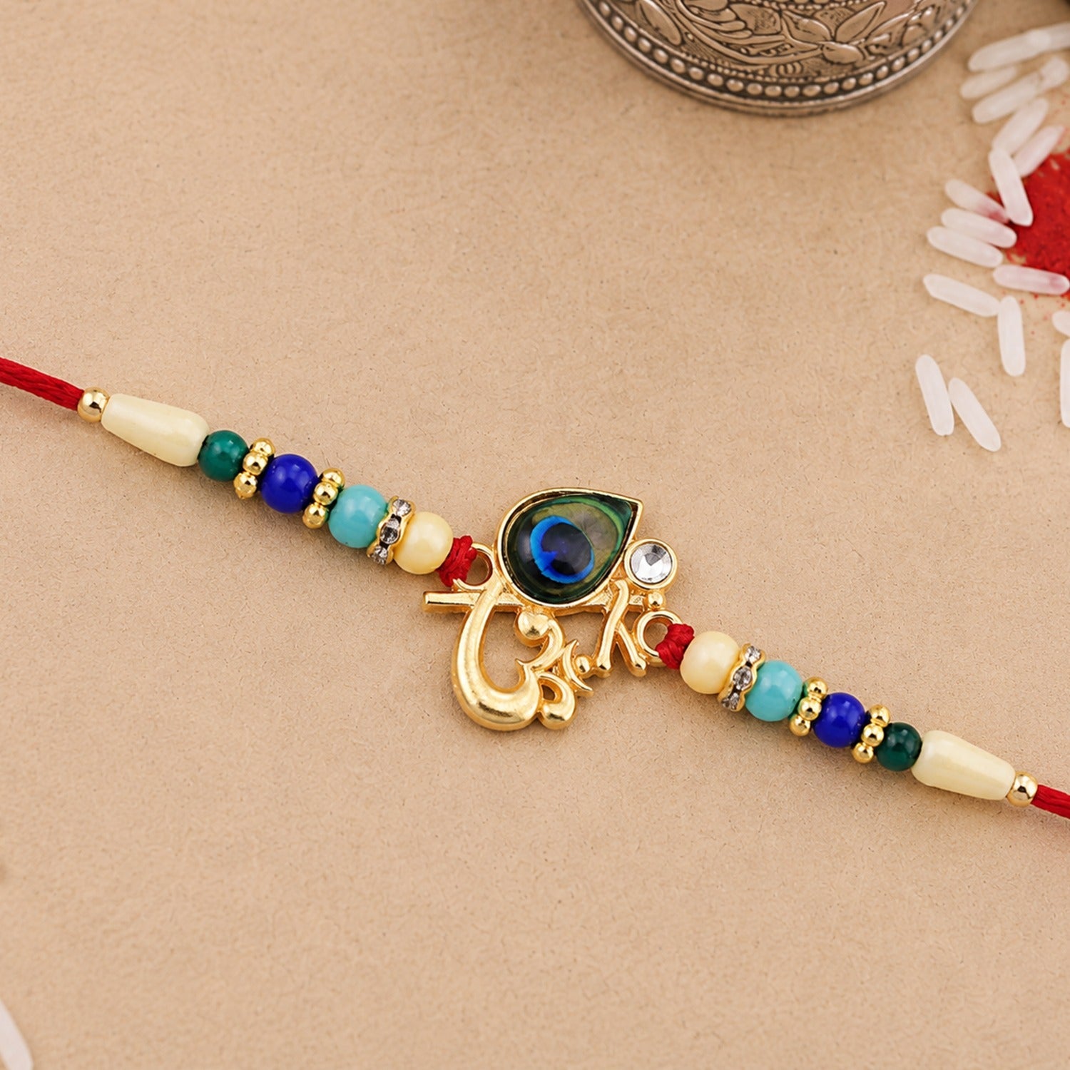 ALVENZA Peacock Feather Rakhi – Divine Multicolor Beads for Brother