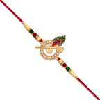 ALVENZA Krishna Flute Rakhi – Stone Studded Peacock Feather Design