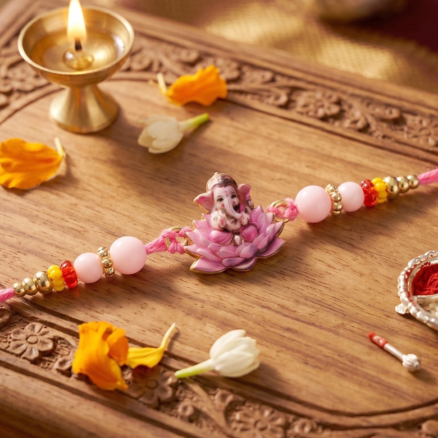 ALVENZA Lord Ganesha Rakhi – Divine Blessings & Elegant Design