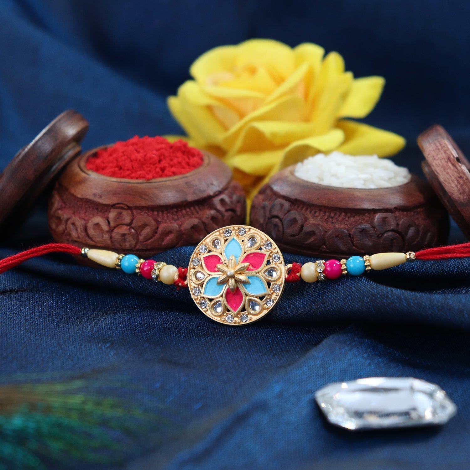 ALVENZA Round Floral Rakhi - Pink-Blue Enamel with Beaded Thread