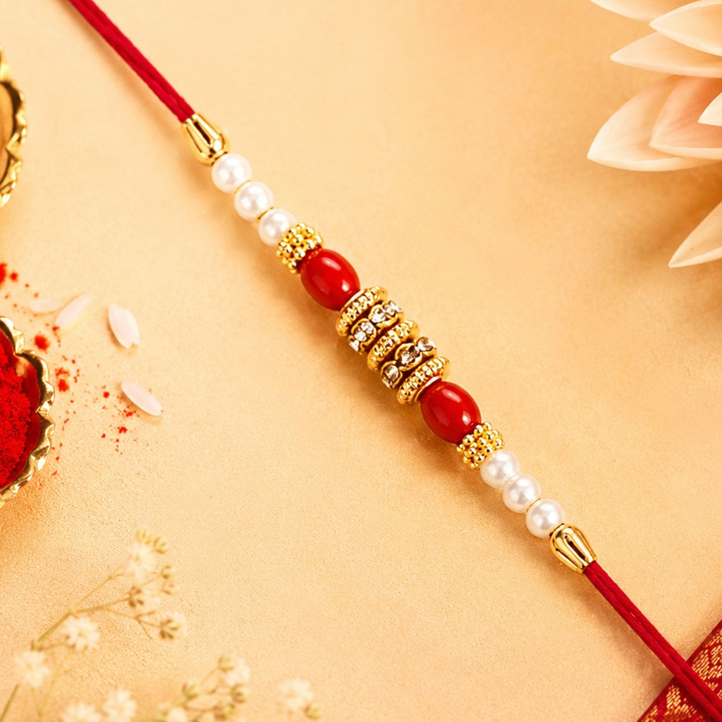 ALVENZA Pearl Beaded Rakhi – Traditional Red & Gold Elegance