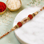 ALVENZA Graceful Pastel Pearl Rakhi with Fine Beads and Premium Raksha Bandhan Charm