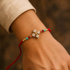 ALVENZA Diamond Crystal Flower Rakhi with Gold Bezels, Turquoise, Red & Golden Beads