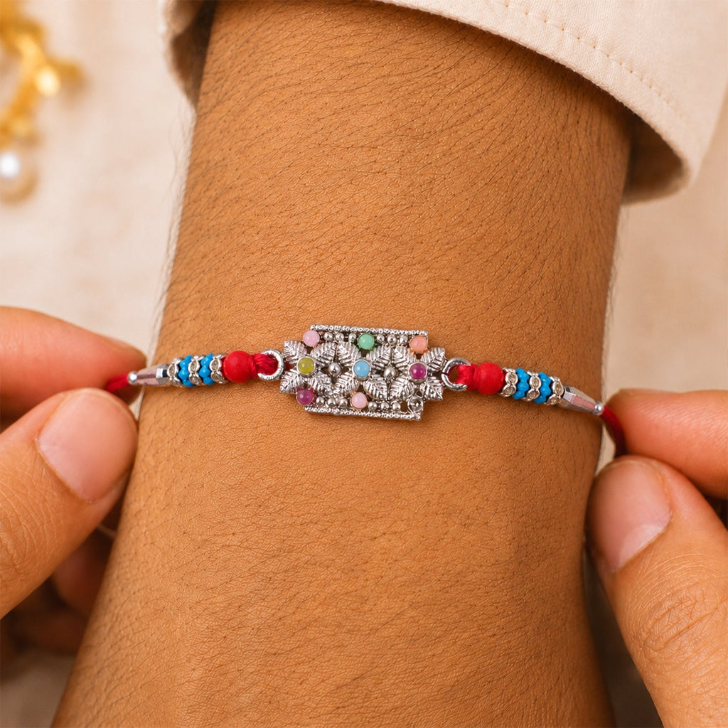 ALVENZA Rectangular Pearl Crystal Rakhi with Red Blue Beads, Roli Chawal Coin and Gift Packing