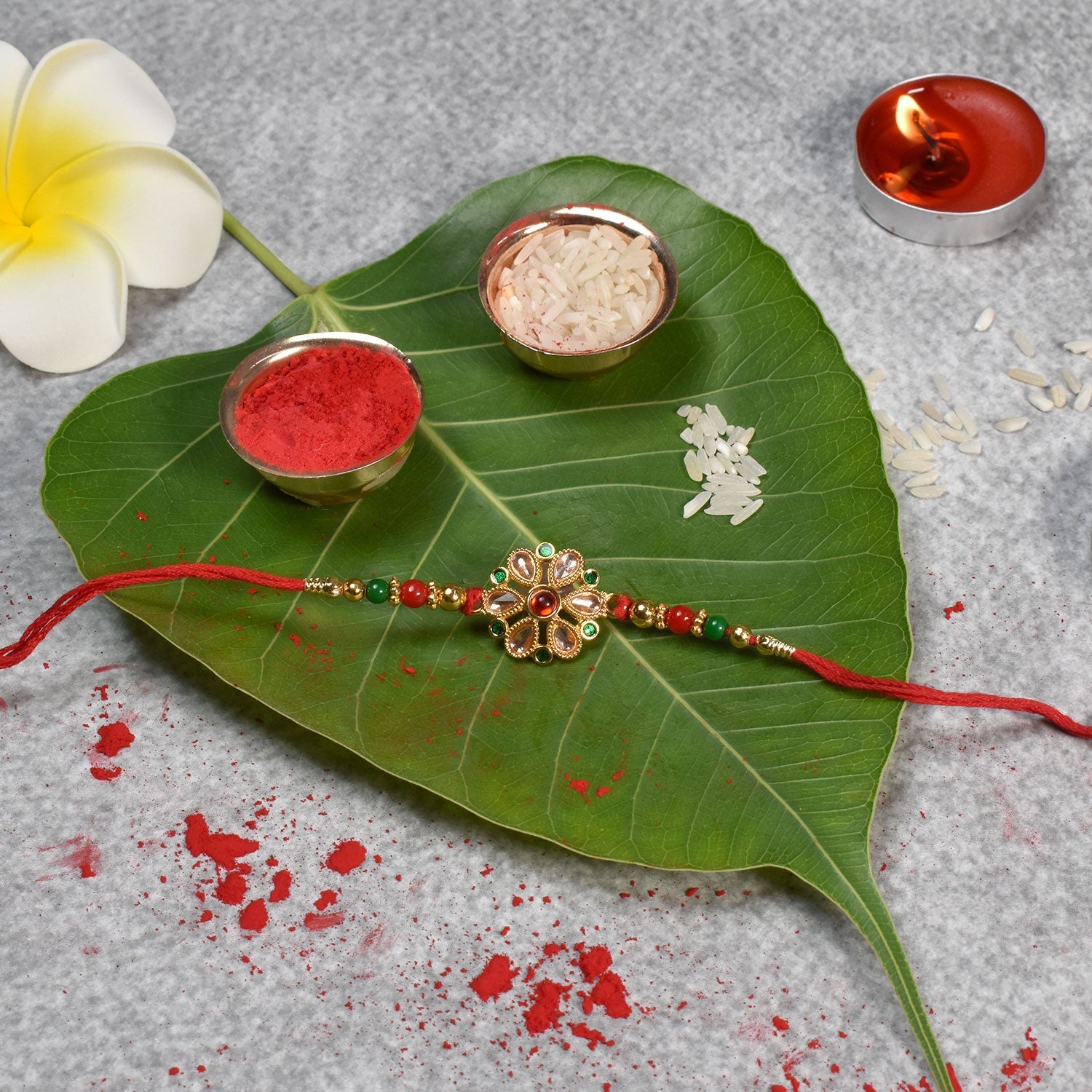 ALVENZA Kundan Rakhi - Elegant Floral Golden Design for Raksha Bandhan