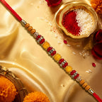 ALVENZA Multicolor Beaded Rakhi – Festive Stone Detail & Red Thread