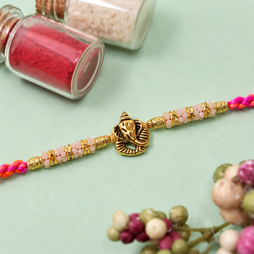 ALVENZA Silver Tone Designer Rakhi with Pastel Beads and Elegant Bracelet Style Finish