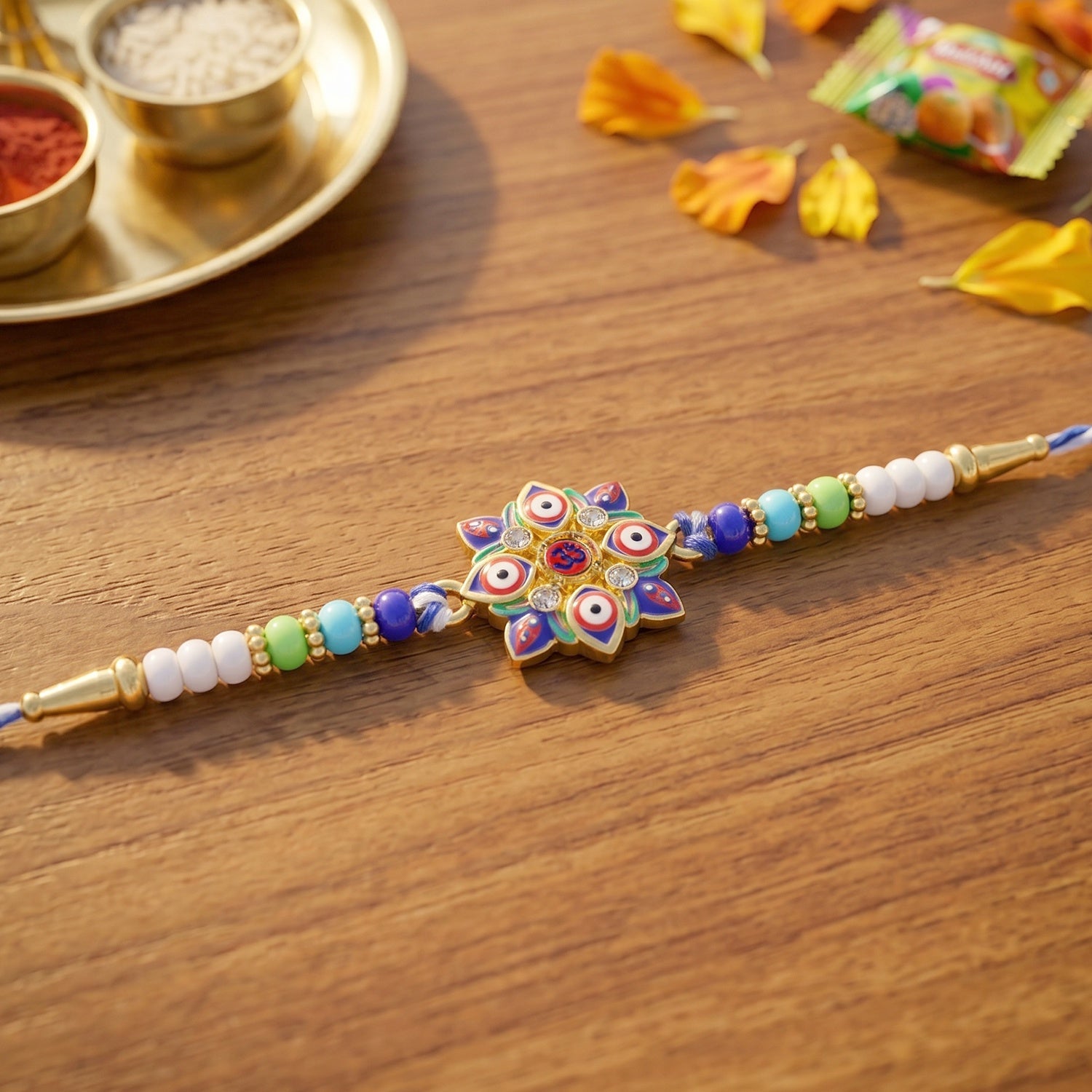 ALVENZA Evil Eye OM Star Rakhi – Symbols of Protection & Tradition