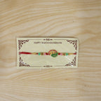 ALVENZA Mini Krishna Peacock Leaf Rakhi – Elegant Traditional Design for Raksha Bandhan
