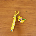 ALVENZA Dinosaur Keychain – Cute Cartoon Charm with Rainbow Strap