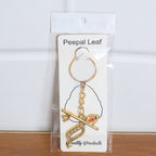 ALVENZA Krishna Metal Keychain – Durable Flute & Peacock Feather Design