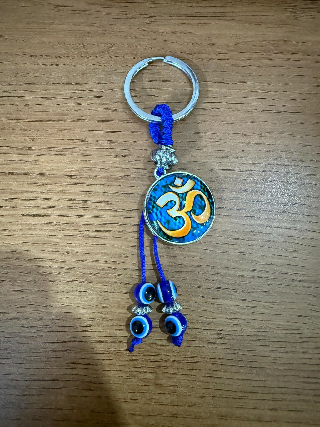 ALVENZA Om Evil Eye Keychain – Spiritual Protection with Blue Beads