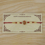 ALVENZA OM Symbol Pearl Frame Rakhi – Elegant Traditional Design for Raksha Bandhan