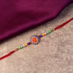 ALVENZA Om Rakhi – Multicolor Beads & Soft Thread for Brother