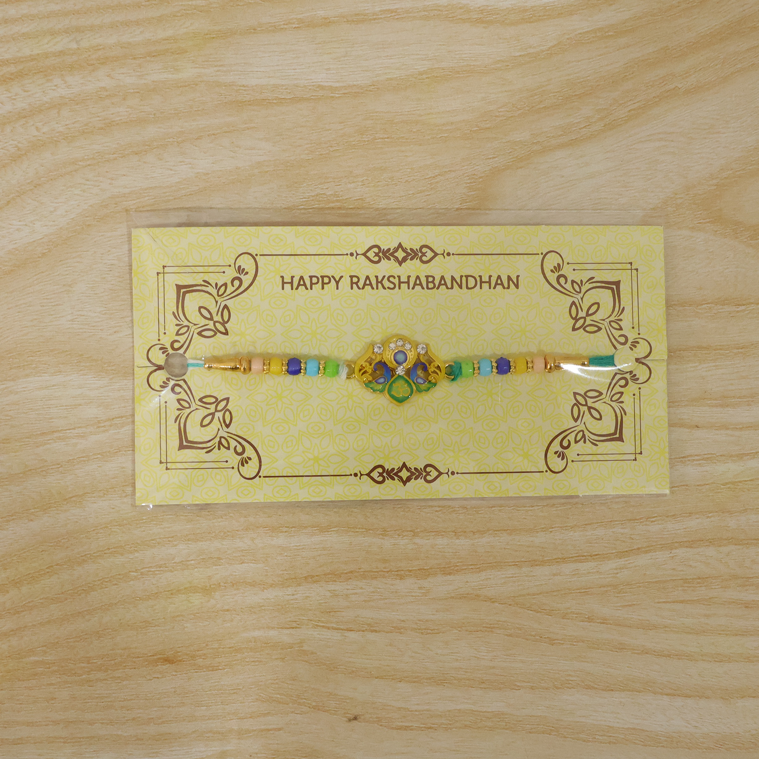 ALVENZA Rakhi – Traditional Colorful Beads and Yellow Thread for Brother