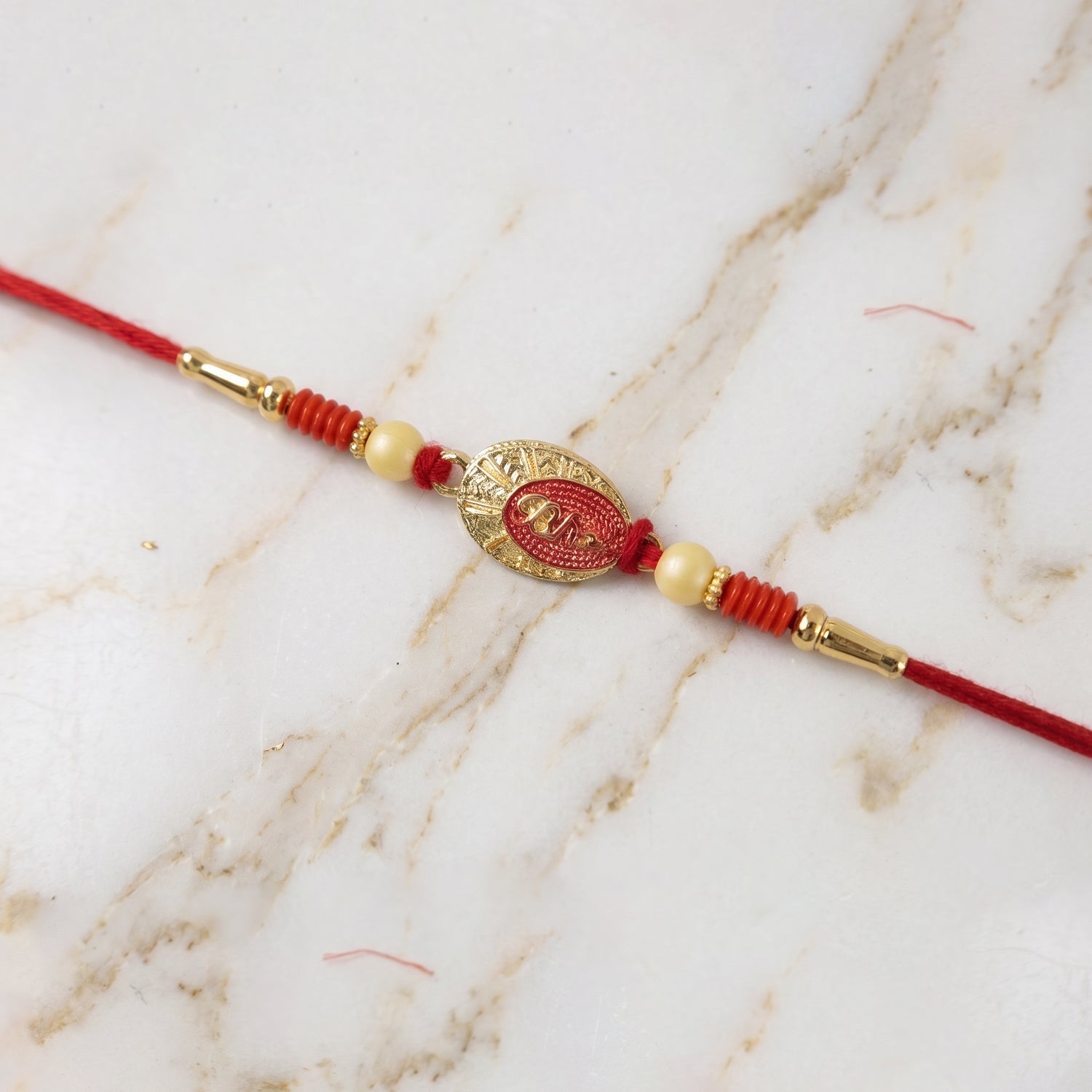 ALVENZA Traditional Rakhi – Elegant thread with decorative beads for Raksha Bandhan